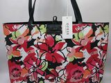 a floral bag with a price tag on it