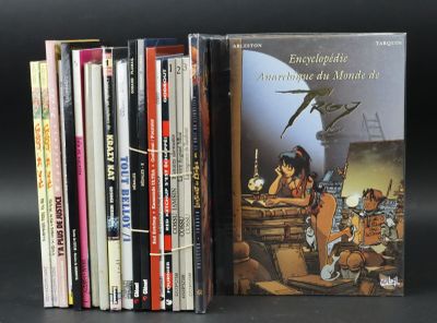a lot of books that are sitting on a table