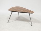 a wooden table with metal legs and a wooden top