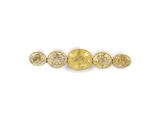 a group of yellow sapphires on a white background