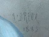 a close up of a graffiti on the side of a building