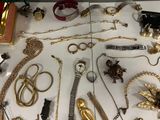 a table with a lot of jewelry on it