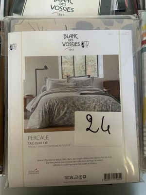 a box of bedding that is on display in a store