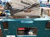 a blue box with a circular saw on top of it