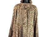 a mannequin mannequin wearing a leopard print coat
