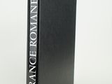 the front cover of a black book with white writing on it