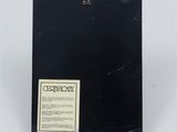 an image of a close up of a black box with a label on it