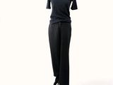 an image of a mannequin wearing a black top and pants