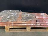 a pallet with many bags of food on top of it