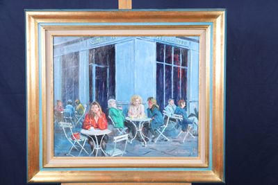 une peinture représentant un groupe de personnes assises à une table