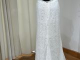 the back of a wedding dress on a mannequin mannequin mannequin mannequin mannequin mannequin mannequin mannequin