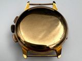 an image of a close up of a watch on a white surface