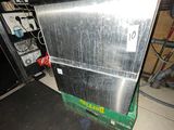an image of a metal dishwasher sitting in a kitchen