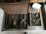a box full of tools sitting on the floor