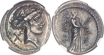 a close up of a silver coin with a woman on it