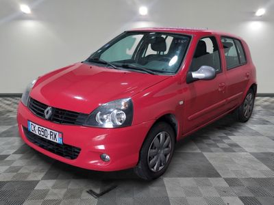 a picture of a red car parked in a garage