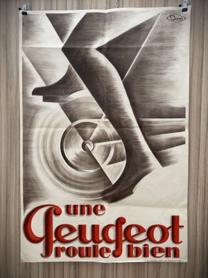 a black and white photo of a poster on a wooden wall