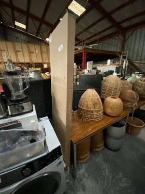 many baskets on a table in a warehouse