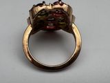 an image of a close up of a ring on a table
