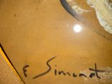 a close up of a sign on the wall of a bathroom