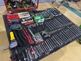 many tools on the table in the garage