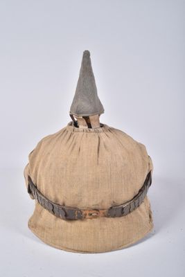 a small hat with a gray hat on top of it