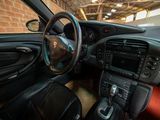 the interior of a car with a steering wheel, dashboard, and dash board