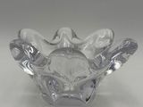 an image of a clear glass bowl on a white surface