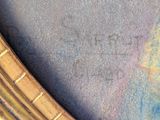 a picture of a close up of a clock on a wall