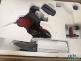a box that has a hole in it with tools inside of it