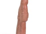 an image of a red stone figurine of a woman