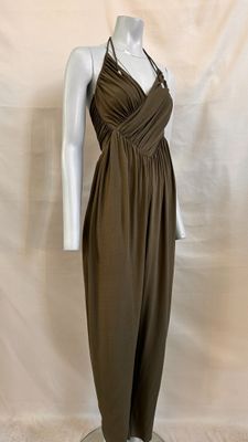 an image of a mannequin wearing a brown dress on a mannequin stand