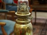 a jar of pickles sitting on a table in a living room