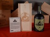 a bottle of wine sitting next to a box of wine