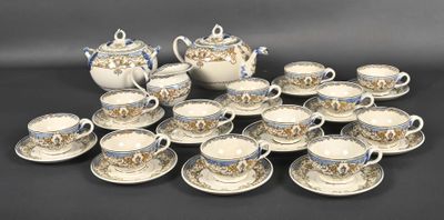 many cups and saucers sitting on the table