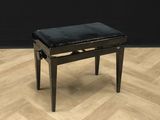 une photo d'un piano noir posé sur un parquet en bois massif