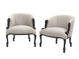 une paire de fauteuils rembourrés noirs et blancs
