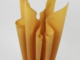 a yellow lamp that is sitting on a table