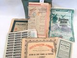 some old papers are sitting on top of a white table