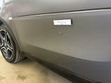 a car that has a sticker on the side of it