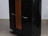 a black cabinet with two doors and a brown door
