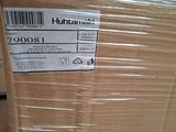 a cardboard box with a label on it in a warehouse