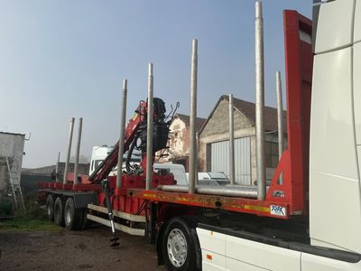 a large truck with a crane on the back of it