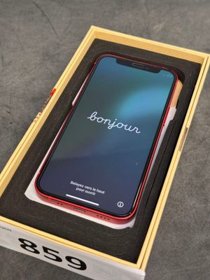 an iphone xr in a box on a table with the box open