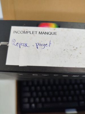 a computer keyboard and a computer mouse on a desk