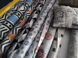 many different types of ties laid out on a table