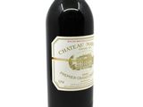 a bottle of wine that is sitting on a table