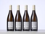 three bottles of wine sitting on top of a table next to each other