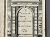 an open book with a drawing of a building on the cover