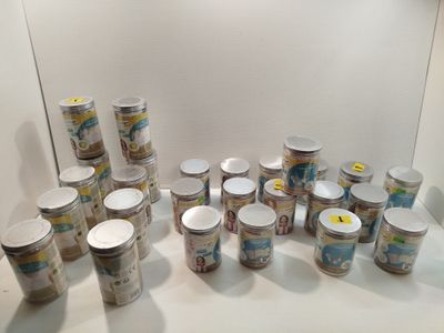 a lot of cups that are sitting on a table